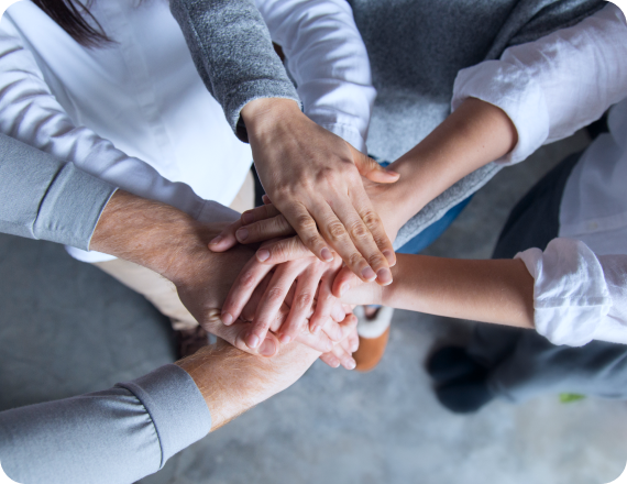 four-team-members-expressing-togetherness 1